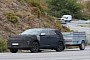 2024 Hyundai Kona Electric Prototype Proves It Can Tow, Reveals Massive Wrap-Around Screen