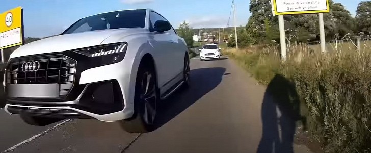 Audi Q8 Getting Too Close to a Cyclist