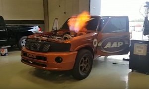 2,500 HP Nissan Patrol Sets 206.9 MPH Half-Mile World Record with a Flying Door