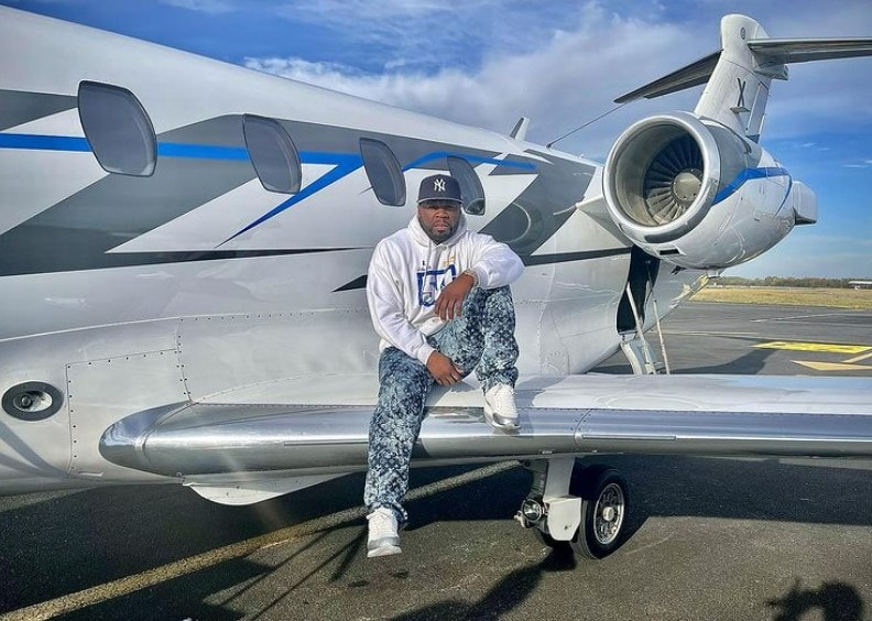 50 Cent Sits on Airplane Wing, Says He’s the “Big Wheel Turning ...