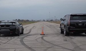 800 HP Cadillac Escalade vs. Stock Camaro ZL1 Is a Hennessey-Style Drag Race
