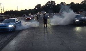 9s Dodge Charger Hellcat Drag Races Another Hellcat in Pursuit of Happiness