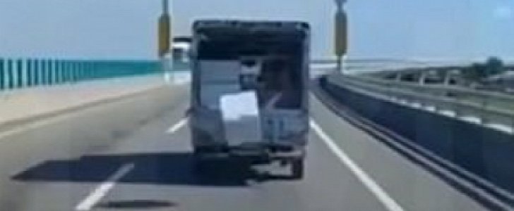Styrofoam box jumps in and out of speeding truck on the highway