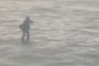 A Different Kind of Commute: Man in Business Suit Paddles Across Hudson River