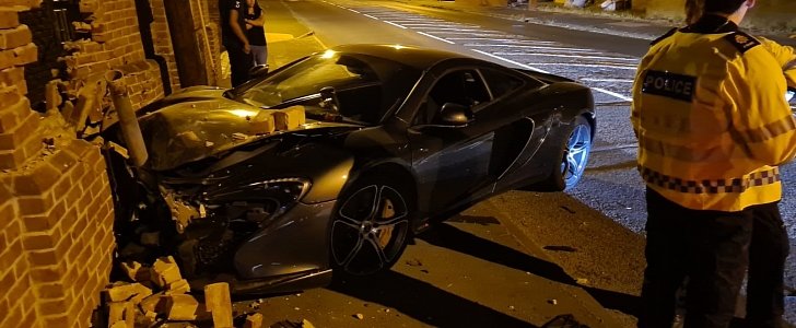 McLaren 570S crashes into brick wall on empty street, becomes viral star