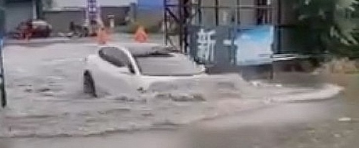 Tesla Model 3 "swims" on flooded road in China
