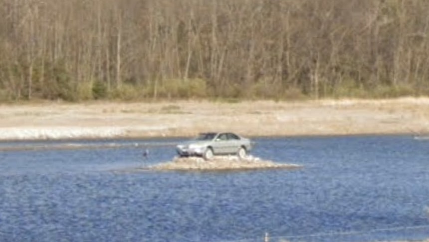 Volvo sedan stranded for ages on a tiny island