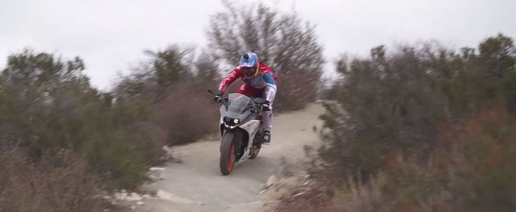 Aaron Gwin riding a KTM RC390 downhill