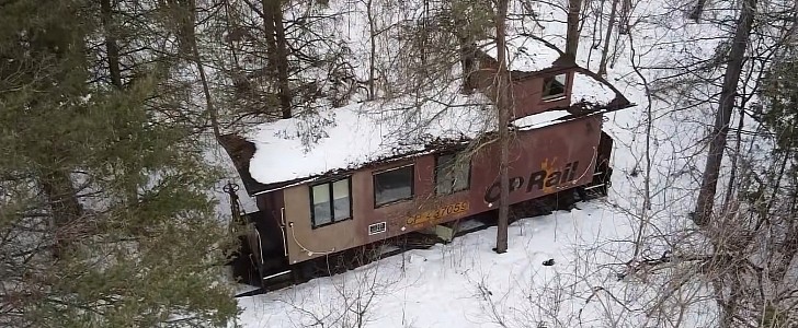 caboose abandoned in the woods