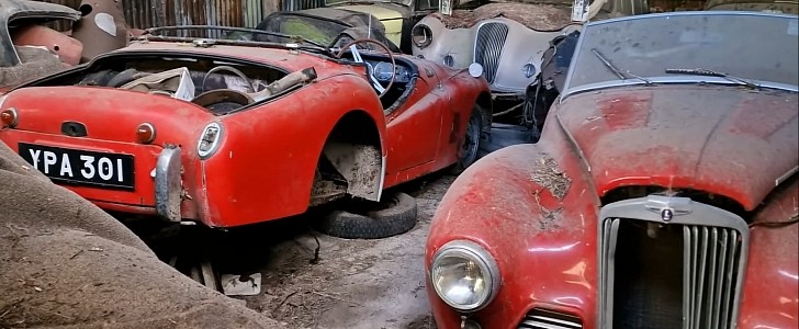 classic car collection on abandoned farm