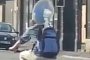 AC on the Go: Cyclist Keeps Cool With Electric Fan in Backpack