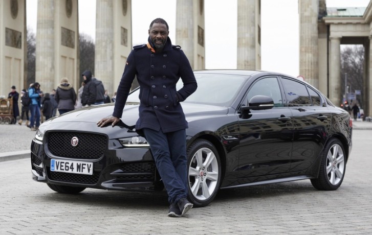 Idris Elba next to the new Jaguar XE in Berlin