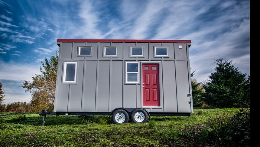 The Red Door is a custom-built tiny house with a minimal footprint