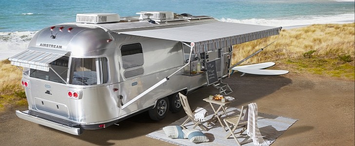 Aistream's classic silver bullet travel trailer is now featuring Pottery Barn furniture, decor and accessories.