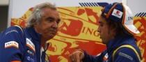 Alonso Stands by Briatore in Crash Scandal