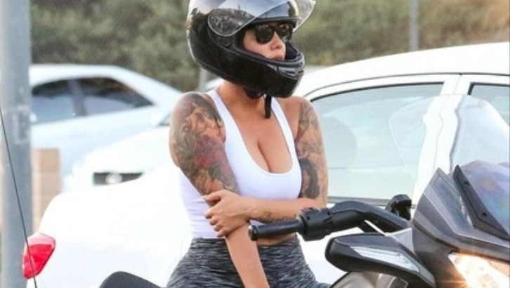 Amber Rose riding a Can-Am