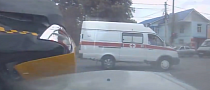 Ambulance Flips a Taxi in Crazy Russian Car Crash