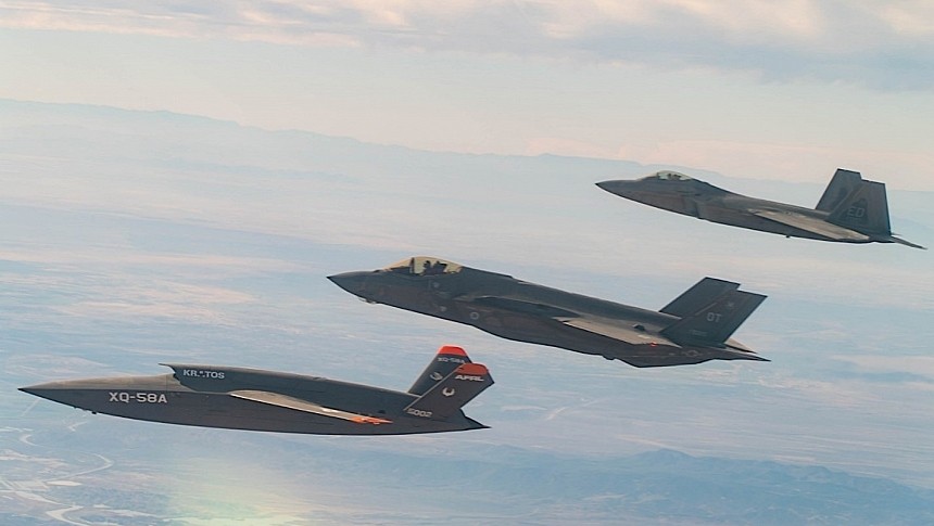 XQ-58A Valkyrie flying with USAF airplanes