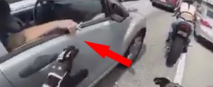 Moron driver slaps innocent passenger
