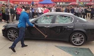 Angry Chinese Maserati Owner Destroys His Car in Protest