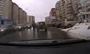 Angry Pedestrian Takes it Out on Car
