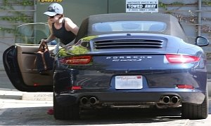 Anne Hathaway Seen Driving Her Porsche 911 Carrera S to the Gym