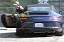 Anne Hathaway Seen Driving Her Porsche 911 Carrera S to the Gym