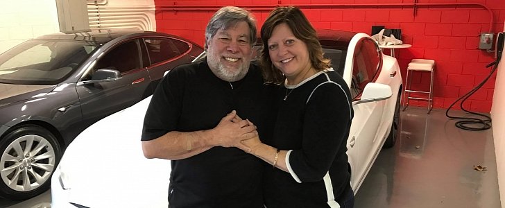 Steve and Janet Wozniak next to their 2nd Model S