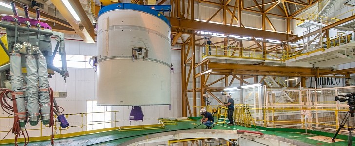 An Ariane 5 rocket is getting stacked on top of the core stage
