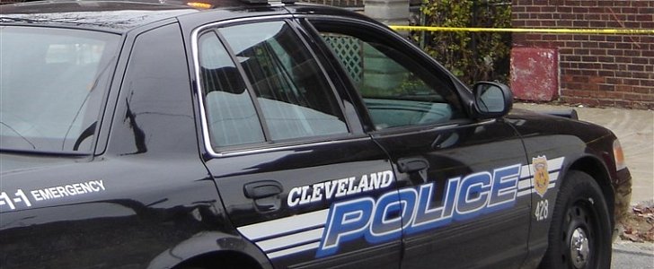 Cleveland police arrested armed robber for stealing Chevrolet Impala, threatening passenger sleeping inside