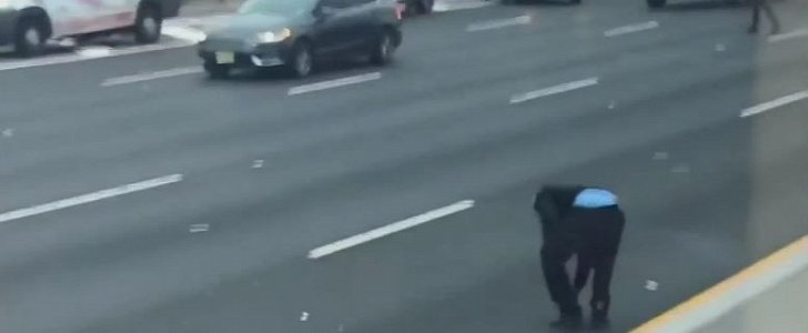 Driver bends to pick up loose cash on New Jersey highway, after armored truck mishap