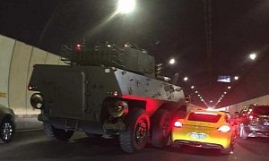 Armored Vehicle Hits Porsche Cayman in Bizarre Chinese Crash