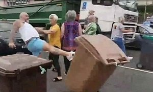 Audi Driver Karate Kicks Garbage Bin to Intimidate Elderly Protesters