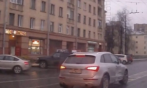 Audi Q5 Driver Learns the Dangers of Driving on Tram Lines