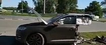 Audi Q7 Split in Half After Crash in Russia Is Suspicious