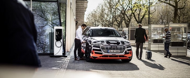 Audi e-tron SUV charging not at home, but on the street