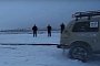 Audi S6 vs. Lada Niva Tug of War Shows Russian Winter Sports