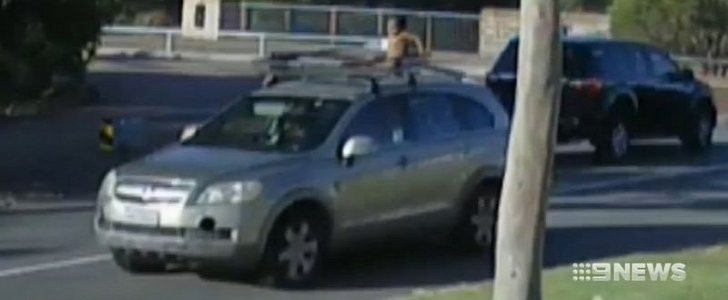 Mom drives off with 4-year-old on top of her Holden Captiva, doesn't stop until motorists flag her