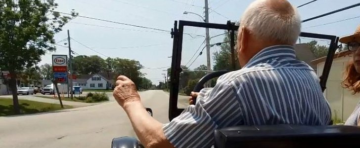 87-year-old Canadian drives a 1927 Ford Model T and signals with his arm a right turn