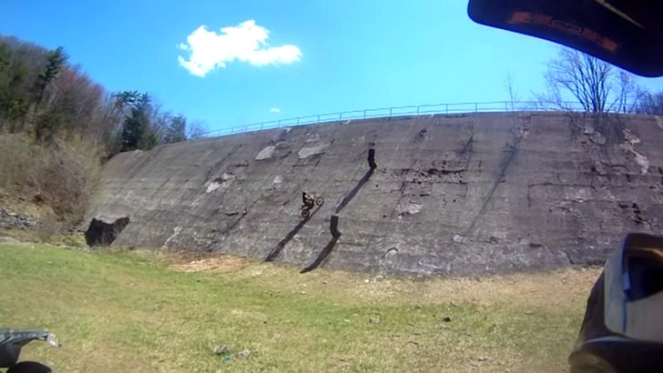 Rider learn how hard turning a bike ona  slope is