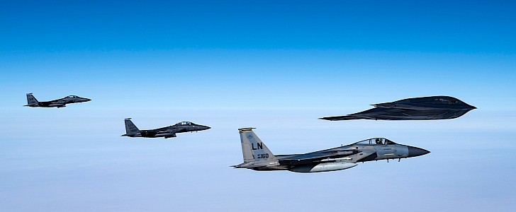 B-2 Spirit, F-15C Eagle and F-15E Strike Eagles flying together