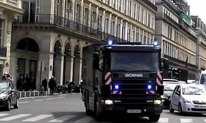 Bank of France Transports Money in Four Large Trucks Through Paris