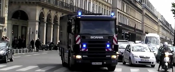 Bank of France Transports Money in Four Large Trucks Through Paris
