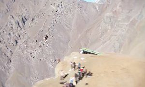Base Jumper Rides Motorcycle Off 1000m Cliff