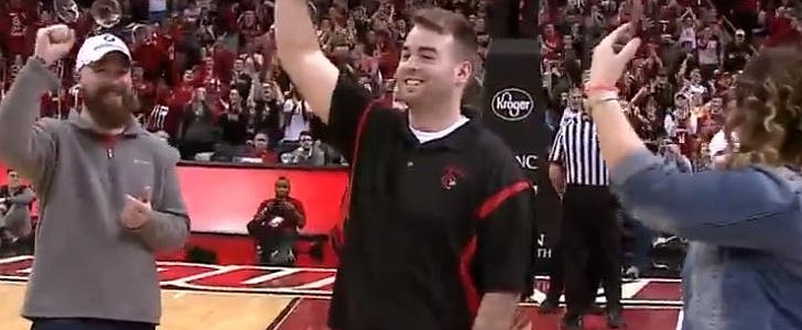 Basketball fan gets brand new BMW X3 in UofL halftime giveaway