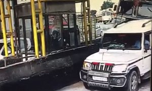 Beer Truck Smashes Into SUV at Toll Booth