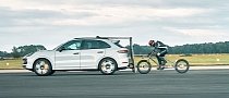 Bicycle Rider Slipstreams Behind a Porsche Cayenne Turbo to Set Speed Record