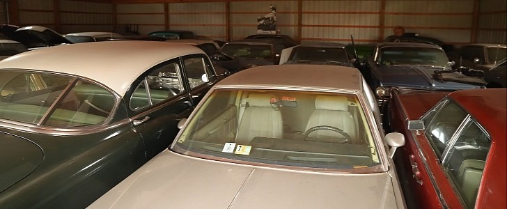 Buicks and Rolls-Royces stored in barns