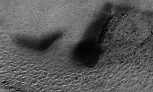 Big Nose and Half of a Face Seem to Be Lurking Underground in Creepy Photo of Mars