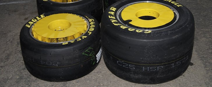 A set of "staggered" wheels with racing slicks from GoodYear